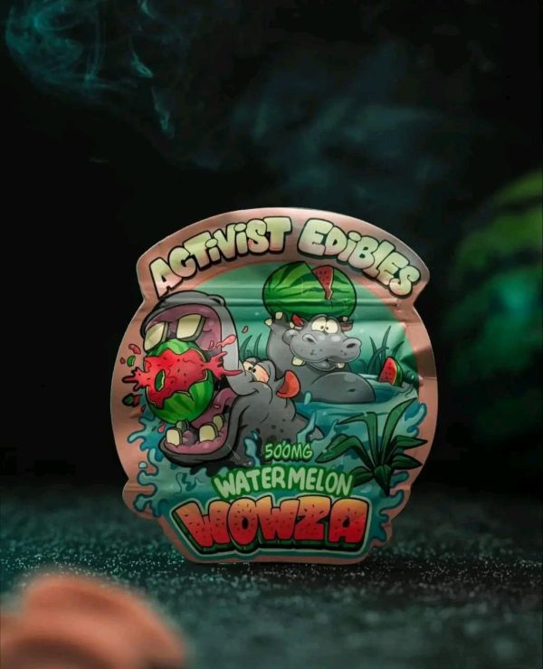 A pack of Activists Edibles Watermelon Wowza Delta 9 THC Gummies, 500mg total, featuring bright pink and green sugar-dusted gummy triangles.