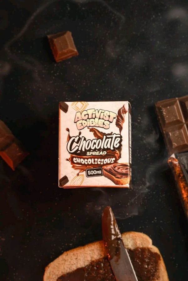 A jar of Activists Edibles Chocolate Spread with a smooth, glossy texture, infused with 500mg THC for high-potency edible dosing.